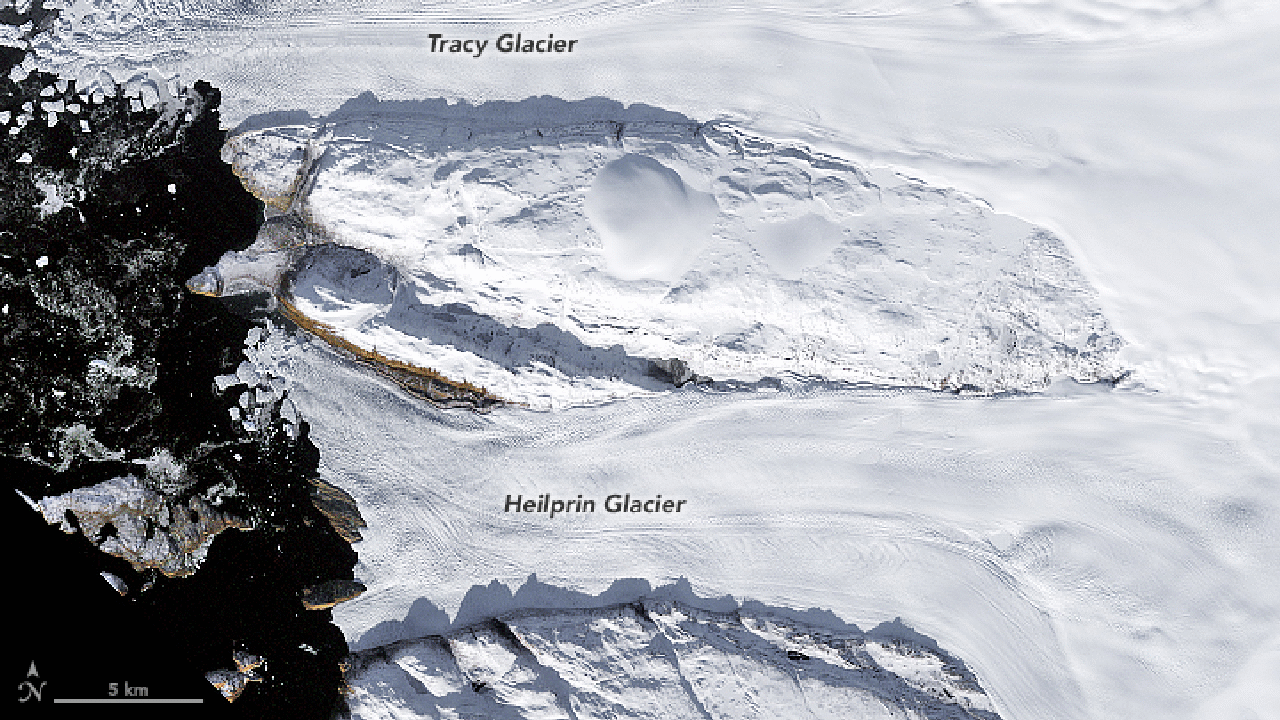 (nasa) at a glance a pair of photos show how much two greenland