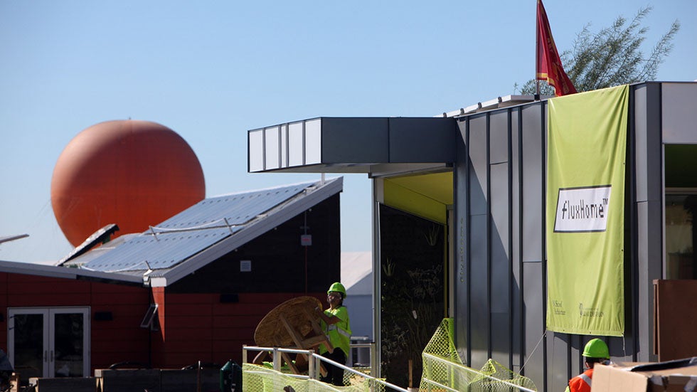 The University of Southern California's entry in The U.S. Department of Energy Solar Decathlon nears completion on the seventh day of Assembly at Irvine, California's Orange County Great Park. (Image: Stefano Paltera/U.S. Department of Energy)