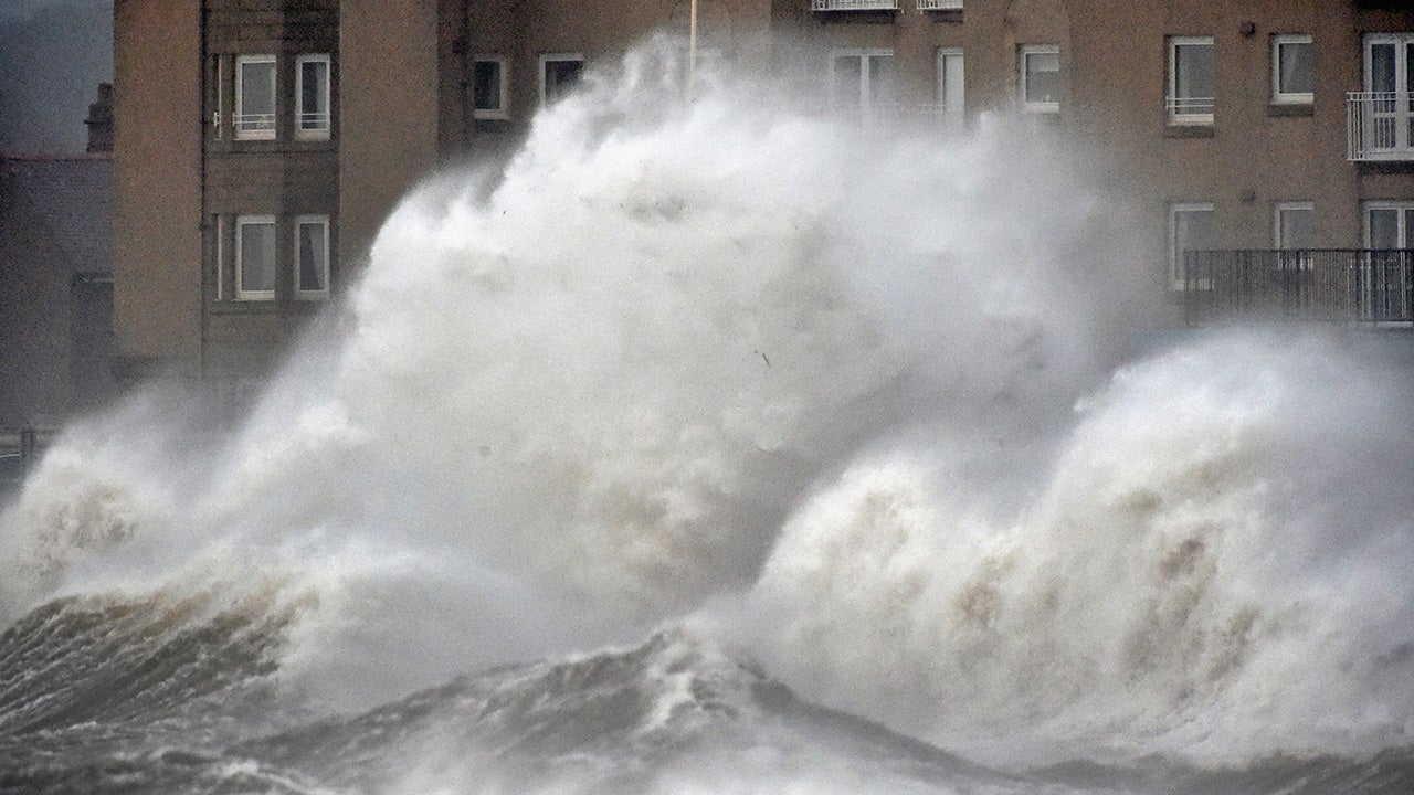 PRESTWICK, UNITED KINGDOM: Waves crash against the promenade wall on December 10, 2014 in Prestwick, Scotland. High winds and large waves hit the North West Coast of the UK and Northern Ireland today  (Photo by Jeff J Mitchell/Getty Images)