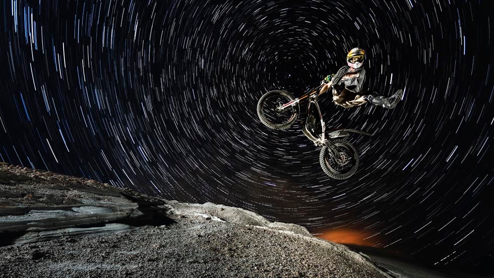 French freestyle trial rider Julien Dupont performs during Riding to the Moon on Milos Island, Greece on August 1, 2013. (Samo Vidic/Red Bull Content Pool)