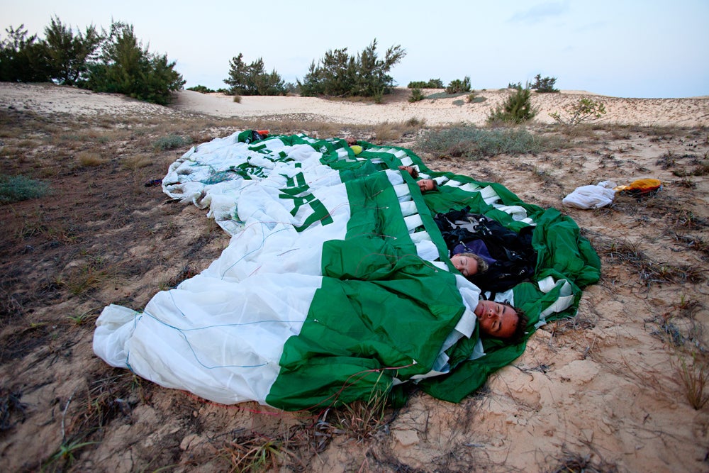 Jody and the group camping in their paragliders overnight in Mozambique. (Image: Jody MacDonald)