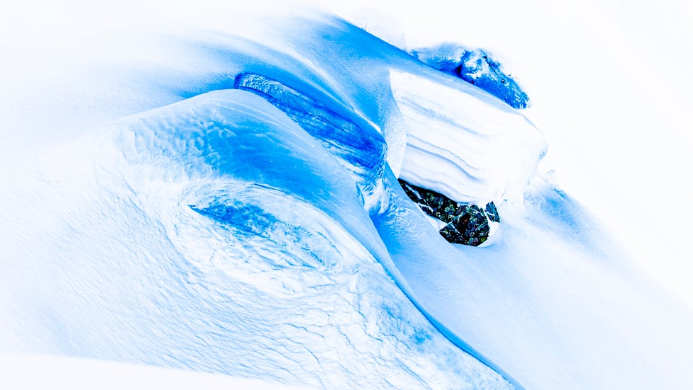 Mammut pro freeriders Nicolas and Loris Falquet and Jeremie Heitz ski on colored snow in Les Marecottes, Switzerland. (Jeremy Bernard and Mammut)