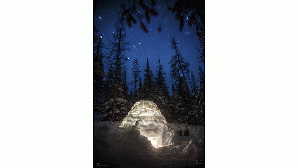 The Portland-based photographer captures an igloo in the Oregon night sky in the Cascade Mountains. (Ben Canales)