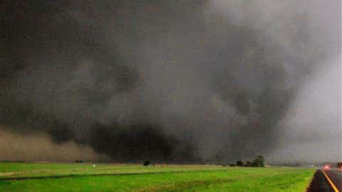A tornado moves north in Canadian County after having just crossed SH-3,the Northwest Expressway,towards Piedmont,Okla. on May 24,2011. (AP Photo/The Oklahoman,Paul Southerland)