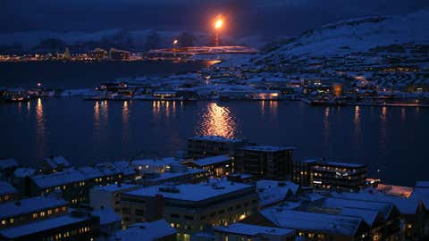 Norway's Snøhvit, or Snow White, is the northernmost natural gas facility in the world — and some oil companies' model for the future of the Arctic. Heat from the flame seen spouting into the air above could be felt from two miles away. (Photo courtesy McKenzie Funk)