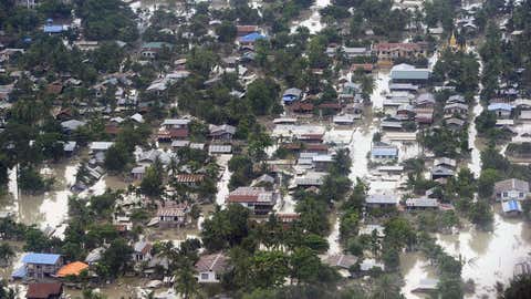 An aerial view shows floodwaters inundating houses and vegetation in Kalay, upper Myanmar's Sagaing region, on Aug. 3, 2015. (Ye Aung Thu/AFP/Getty Images)