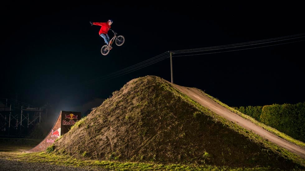 Dawid Godziek performs a suicide nohander at his backyard in Suszec, Poland on October 23 2013. (Bartek Wolinski/Red Bull Content Pool)
