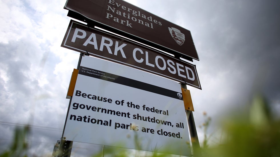 A sign near the entrance to the Everglades National Park on October 7, 2013 in Florida. The park is closed as the US House and Senate are into day 7 of not being able to agree on a bill to fund the United States government. National Parks around the nation are closed. (Joe Raedle/Getty Images)
