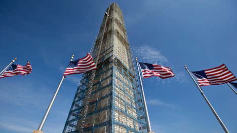 Scaffolding surrounds the Washington Monument Sunday, June 2, 2013 in Washington The monument has been closed since the 2011 earthquake and half of the needed repairs have been funded by a $75 million donation from philanthropist David Rubenstein  (Image: AP Photo/Alex Brandon)