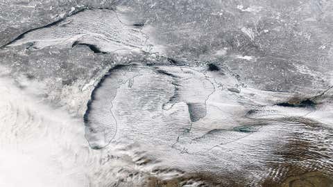 Lake-effect snowbands blanket the Great Lakes region on Jan. 5, 2015 in this high-resolution image from NASA's Aqua satellite. (NASA/Worldview)