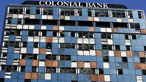The Colonial Bank building,damaged by Hurricane Wilma,stands October 26,2005 in Miami,Florida. (Photo by Carlo Allegri/Getty Images)