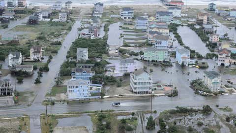 Shoreside flooding damage is seen in North Carolina. (uscgmidatlantic/twitter.com)
