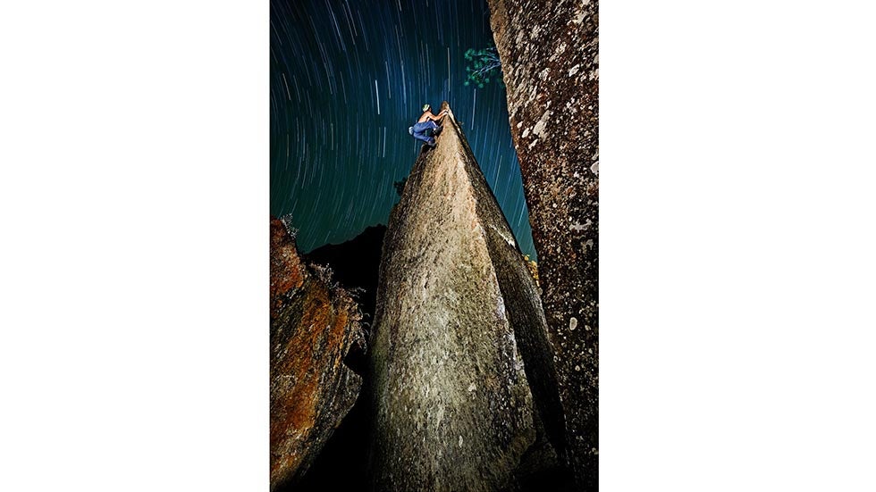 Climber Bernd Zangerl boulders in India. (Ray Demski/Red Bull Illume)