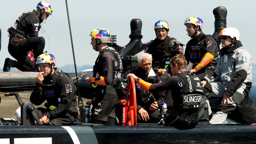 The crew of Oracle Team USA gathers after racing Emirates Team New Zealand during the 34th America's Cup September 12, 2013 in San Francisco. (DON EMMERT/AFP/Getty Images)