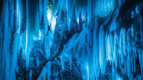 Climbers Daniel Arnold and Stephan Siegrist dangle from the frozen waterfalls of Eidfjord, Norway. The climbers collaborated with photographer Thomas Senf and Swiss sports company Mammut to illuminate the icefalls (which can reach up to 1,640 ft), using colored flares and spotlights. (PHOTOPRESS/Thomas Senf/Mammut)