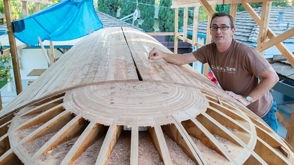 Robinson works on the tsunamiball in his backyard. (Image: Chris Robinson/Tsunamiball.com)