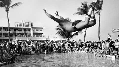 Wes Walton of Lehigh University competes in the belly flop competition at The Candy Store. Walton won the contest, March 10, 1984 in Fort Lauderdale, Fla. (Bob Mack/SF Sun Sentinel/Polaris)