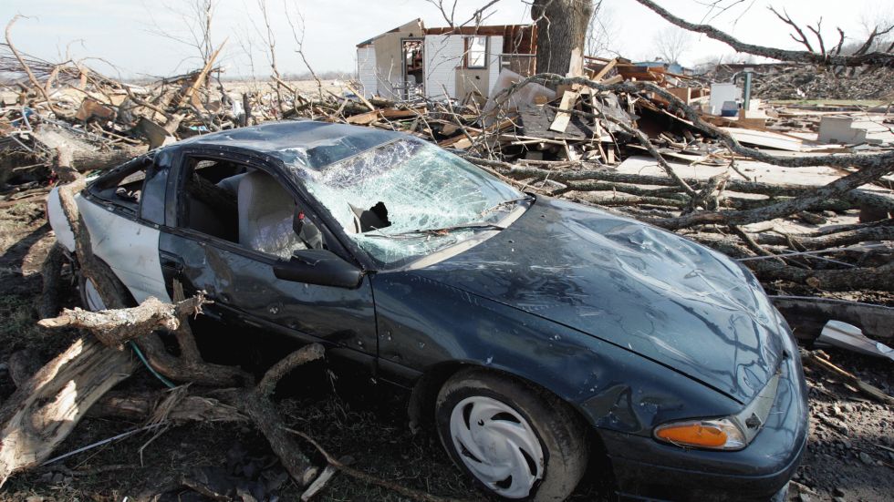 Tornado damage litters the ground in Atkins, Arkansas, February 7, 2008, two days after a tornado ripped through the area. Dozens of tornadoes sliced across southern US states, ripping apart homes and shopping malls, killing at least 52 people and injuring hundreds more, officials said February 6.(Photo SAUL LOEB/AFP/Getty Images) 