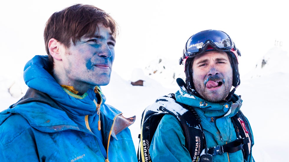 Mammut pro freeriders Nicolas and Loris Falquet after skiing on colored snow in Les Marecottes in the Swiss Alps. Together with photographer Jeremy Bernard, the Falquet brothers wanted 'to portray skiing in a new and unexpected light,' said Nicolas Falquet. (Jeremy Bernard and Mammut)