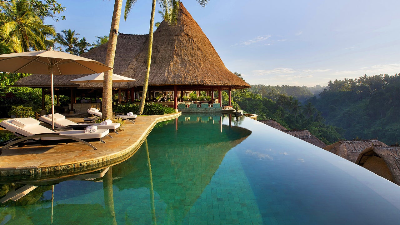 Guests at the Viceroy Bali in Ubud, Indonesia stay in luxury villas that feature private pools but they also gain access to the stunning valley-top infinity pool. (Viceroy Bali)