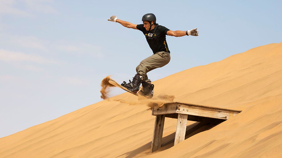 Sandboarder Ivan Fernandez Canalejas performs a stunt in the Namib Desert located in southern Africa on Aug. 19, 2012. (Thomas Dressler/ARDEA/Caters News Agency)