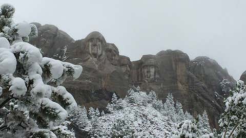 Snow leaves trees sagging at Mt. Rushmore National Memorial on Sept. 11, 2014. (Facebook/Mt. Rushmore National Memorial)