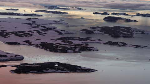 The Windmill Islands rise above the ice floe in Vincennes Bay, and lie some 50 kms from the purpose-built Wilkins glacial blue ice runway where the first Airbus A319 jet will carry passengers from Hobart to Antarctica landed, Jan. 11, 2008. (TORSTEN BLACKWOOD/AFP/Getty Images)