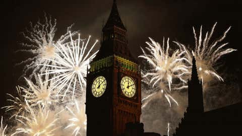 Fireworks explode over Elizabeth Tower housing the Big Ben clock to celebrate the New Year in London, Tuesday, Jan. 1, 2013. (AP Photo/Kirsty Wigglesworth)