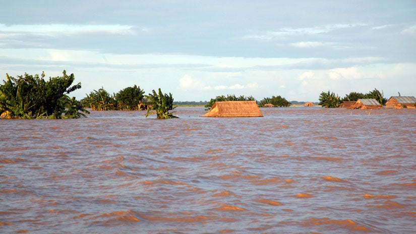 In this Sunday, Aug. 9, 2015 photo, roofs of flooded residences are seen in Hinthada township, Ayeyarwaddy delta, Myanmar. (AP Photo/Khin Maung Win)