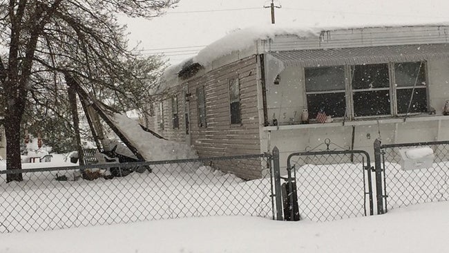 A porch collapsed under the weight of heavy snow in Chadron, Nebraska. (Tony Serbousek/Instagram)