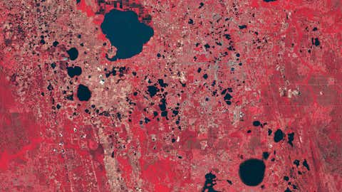 Orlando, Florida, is one of the most visited places in the United States, a fact that has spurred its development during the past three decades. The next six images show just how much the city has expanded. This image is from January 1982. (NASA)