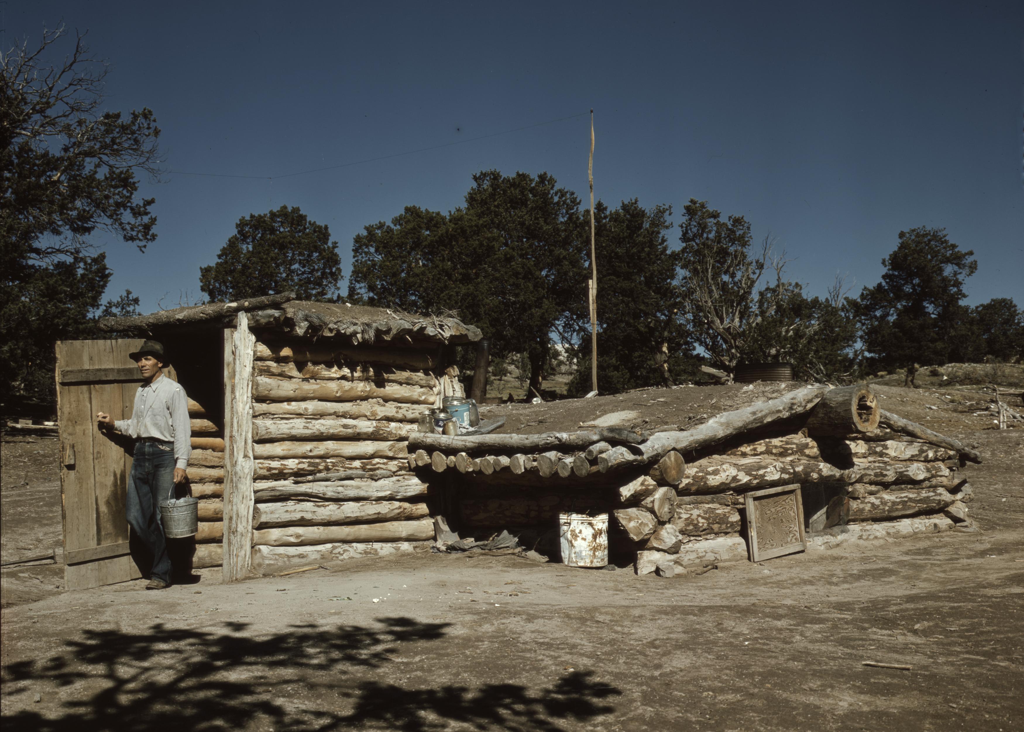 A homesteader in Pie Town, New Mexico at his dugout home in 1940. (Library of Congress/Farm Security Administration/Office of War Information Collection.