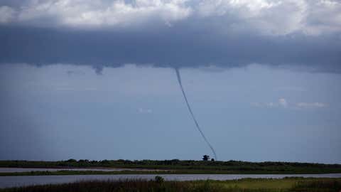 A waterspout touches down over Lake Okeechobee in Florida on July 9, 2007. (Joe Raedle/Getty Images)