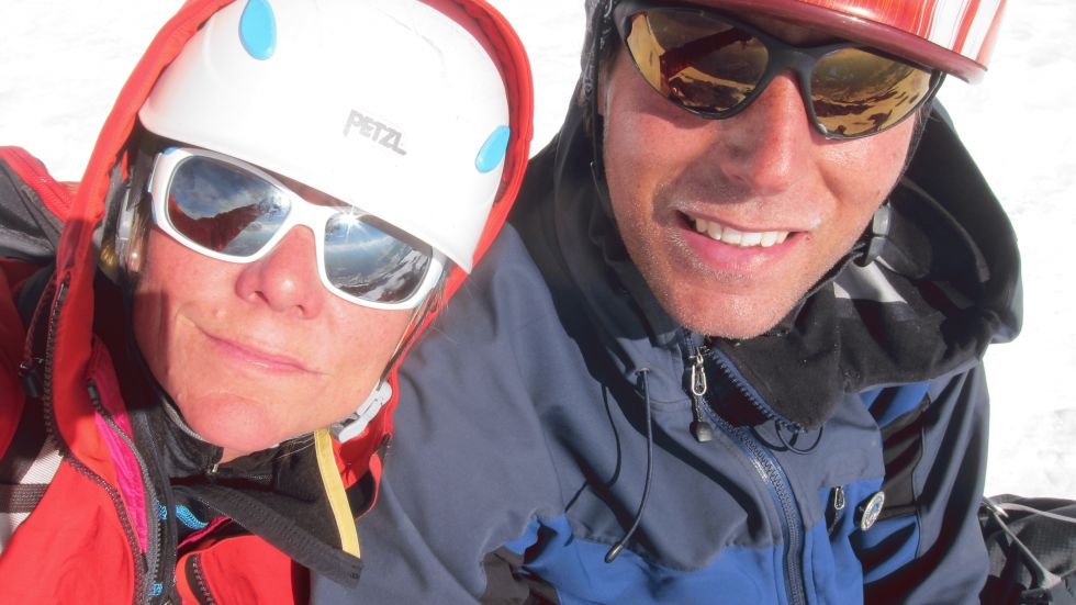 Adam and Caroline George at the summit of the Eiger in the Bernese Alps in Switzerland, during a one-day ascent of the north face. (Photo courtesy of Caroline George)  