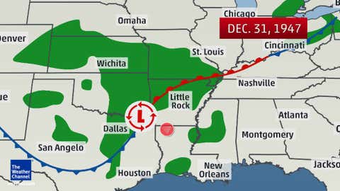 Weather analysis valid Dec. 31, 1947, at 1:30 p.m. Eastern time, just a few hours before a killer tornado ripped across Louisiana and Arkansas in the vicinity of the tornado symbol. Areas of green depict precipitation, some of which was snow over Kansas and Oklahoma. (Adapted from the U.S. Weather Bureau daily weather map.)