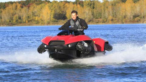 In this Oct. 12 photo, the Quadski, a one-person motor boat that also drives on land, is tested in in Oxford, Mich. (AP Photo/Carlos Osorio)