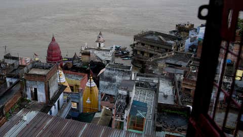 In the photo above, the Manikarnika Ghat, center, is submerged by the flood waters in Varanasi, India, on Aug. 26, 2016. As the mighty Ganges River overflowed its banks following heavy monsoon rains, large parts of the Hindu holy town of Varanasi were submerged by floodwaters, keeping away thousands of Hindu devotees. Varanasi is a pilgrim town that Hindus visit to take a dip in the holy Ganges. 