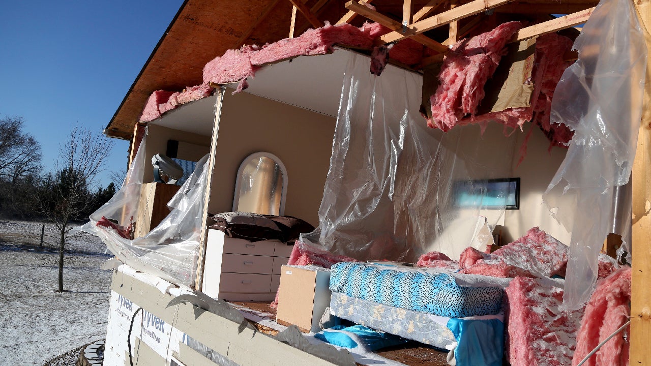 A side of a house is destroyed from a storm Monday evening in Orrock Township near Zimmerman, Minnesota, on Tuesday, March 7, 2017. (David Joles/Star Tribune via AP)