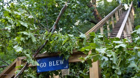 Storm damage along Poplar Ridge in Grand Haven, Michigan, on Friday, July 7, 2017. Nearby, a 72-year-old man was reportedly killed overnight when a large tree fell on his home during a severe thunderstorm on Poplar Ridge. (Cory Morse/The Grand Rapids Press via AP)