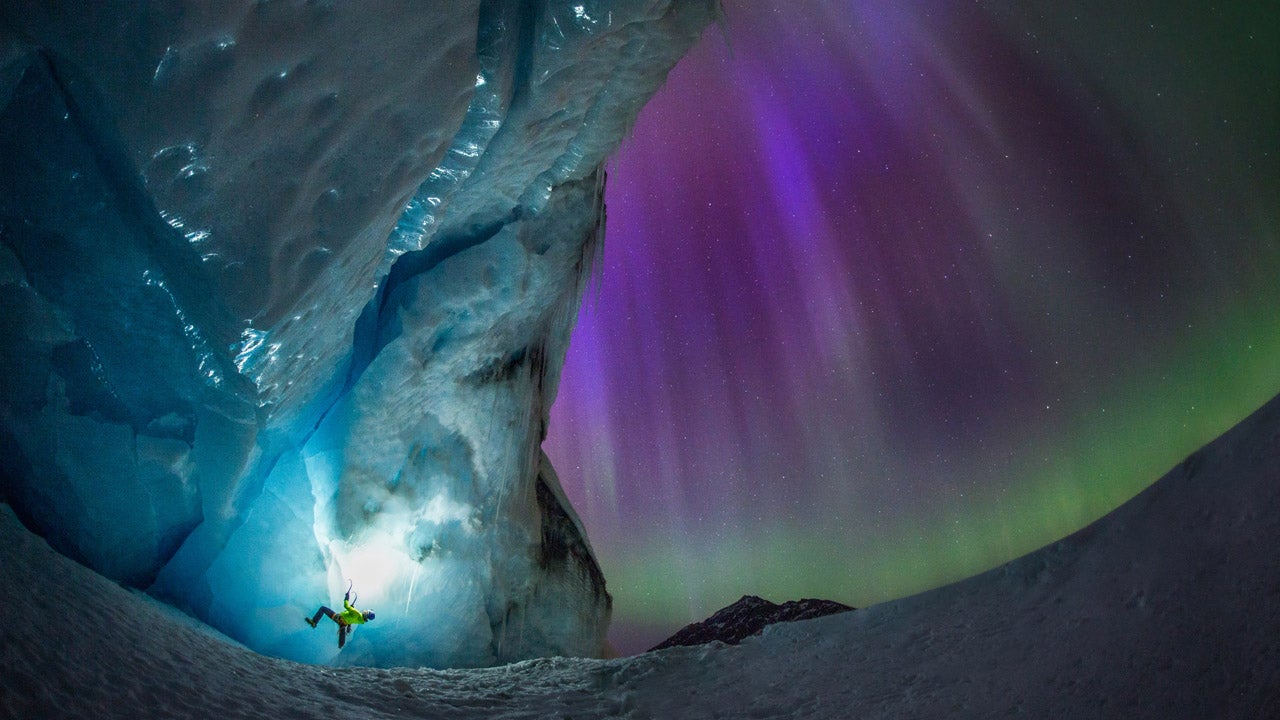 Mike Stuart climbs the Athabasca Glacier, Alberta, Canada while the Northern Lights illuminate the sky. Photographer Paul Zizka, who captured stunning shots of ice climbers Stuart and Takeshi Tani hanging from the glacier the exact moment when the aurora lit up the sky, called the experience one of the highlights of his career. (Paul Zizka/Caters News Agency)