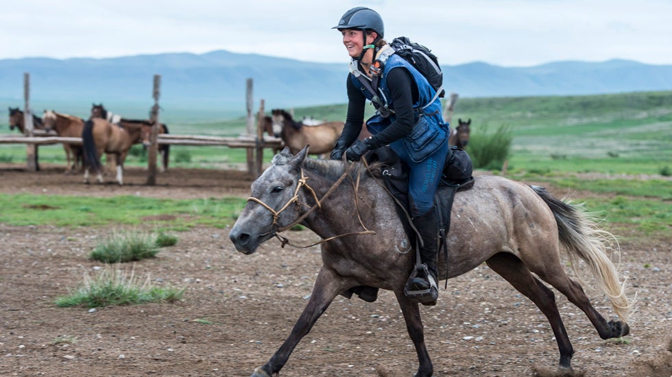 Lara Prior-Palmer races out of horse station 21 in pursuit of Devan Horn, Aug. 10 2013. She started the day one hour and twenty-five minutes behind. (Photo Credit: Richard Dunwoody)
