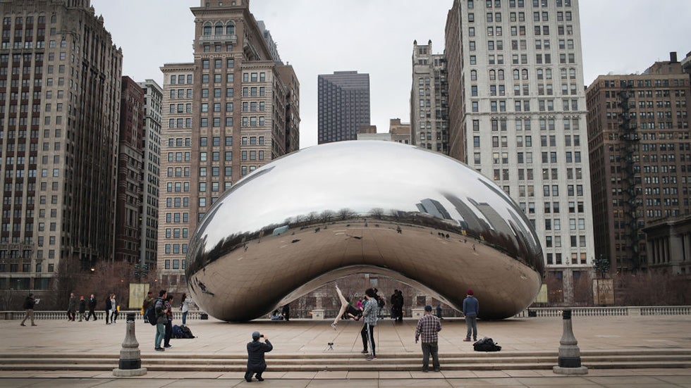Visitors look over the Cloud Gate sculpture in Millennium Park on February 28, 2017 in Chicago, Illinois. ( Scott Olson/Getty Images)