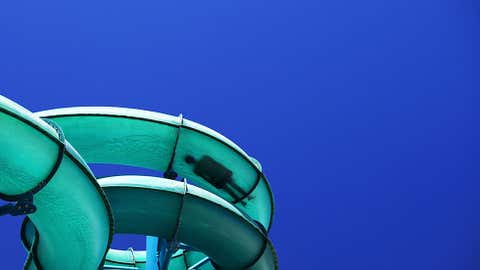 A teenager cools off on a waterslide during a heat wave at Glenelg on Jan. 13, 2014 in Adelaide, Australia. Temperatures are expected to be over 40 degrees Celsius all week with health authorities warning the young and elderly to remain indoors. (Daniel Kalisz/Getty Images)