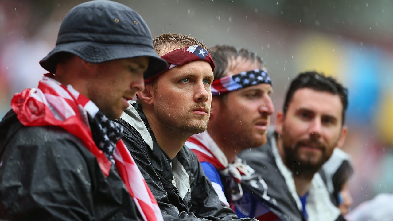 United States fans look on in the rain prior to match between the United States and Germany on June 26, 2014 in Recife, Brazil. (Photo by Kevin C. Cox/Getty Images)