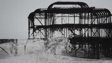 A large section of Brighton's dilapidated West Pier has been washed away in the latest storm on Feb. 5, 2014, in Brighton, United Kingdom. (Mike Hewitt/Getty Images)