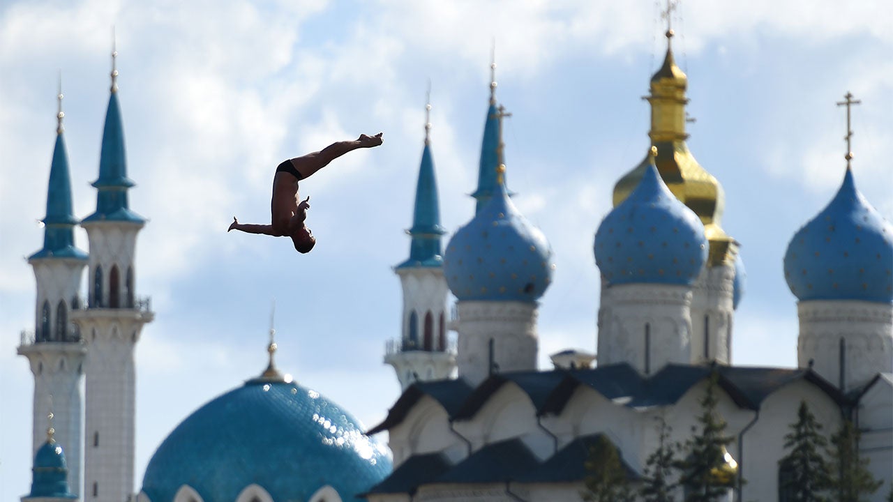 Artem Silchenko of Russia competes in the Men's High Diving 27m preliminary round on day 10 of the 16th FINA World Championships at the Kazanka River on August 3, 2015 in Kazan, Russia.  (Photo by Matthias Hangst/Getty Images)