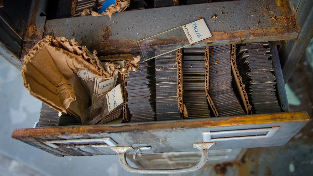 An autopsy theater at St. Elizabeths Psychiatric Hospital is seen in Washington, D.C. (Liz Roll) Hundreds of slides with samples on them sit abandoned in this filing cabinet. 