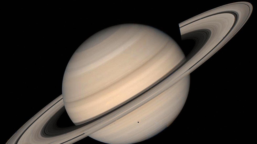 This August 1998 NASA file image shows a true color photo of Saturn assembled from Voyager 2 spacecraft. (NASA/HO/AFP)