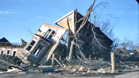 Remnants of a destroyed house lean against a tree after a tornado struck Gorham and Murphysboro, Ill., on Dec. 18, 1957. (Photo used with permission of the Jackson County Historical Society, Murphysboro, Ill.)