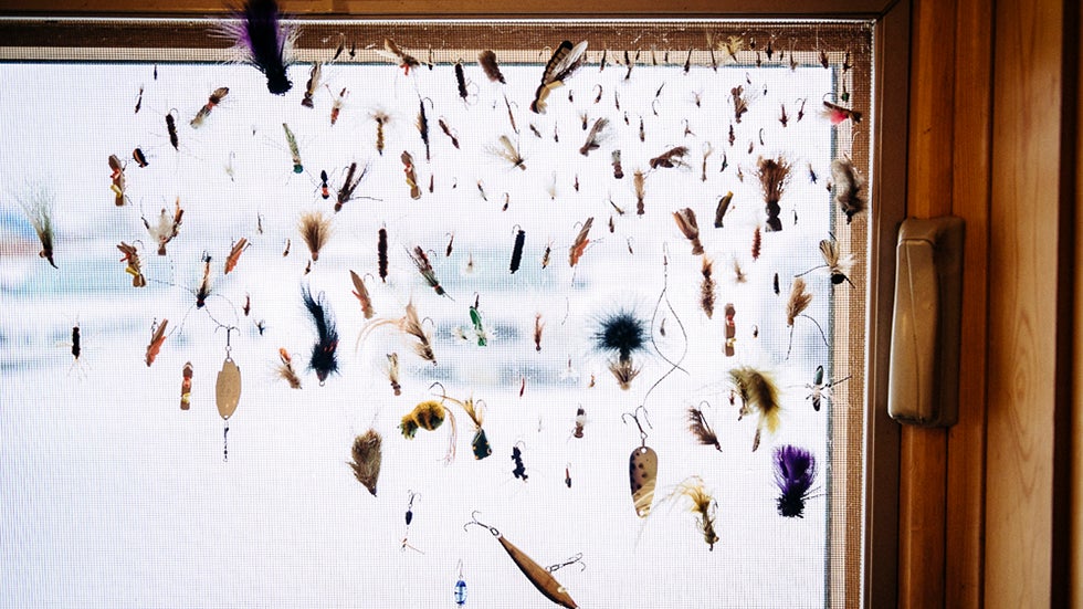 Lures hang on a screen door in Last Chance, Idaho.  (Jeremiah Watt)